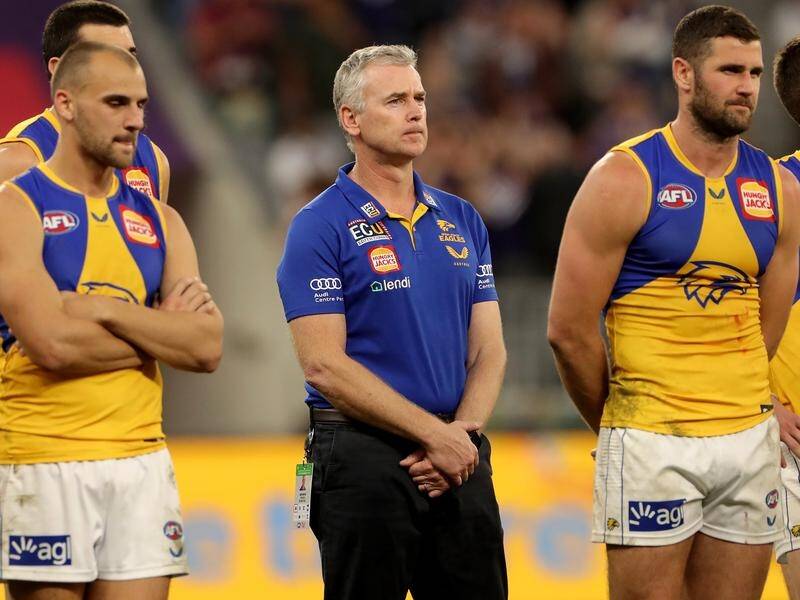 Eagles coach Adam Simpson has fended off talk he's looking for a return to North Melbourne.