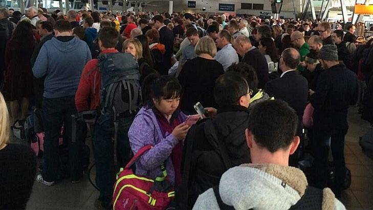 Crowds at Sydney Airport on Friday after a power outage.  Photo: Helen Hayes