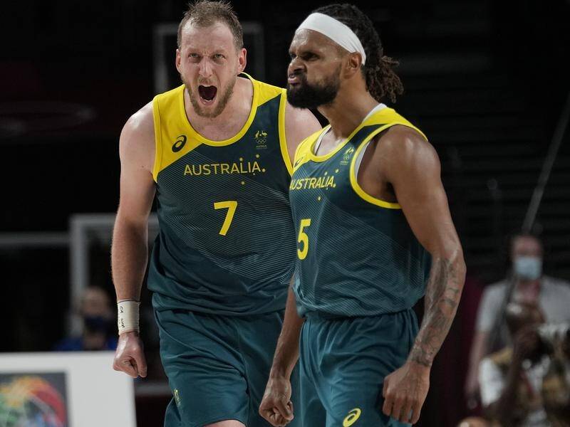 Patty Mills (r) starred as Australia defeated Slovenia to win men's basketball bronze in Tokyo.