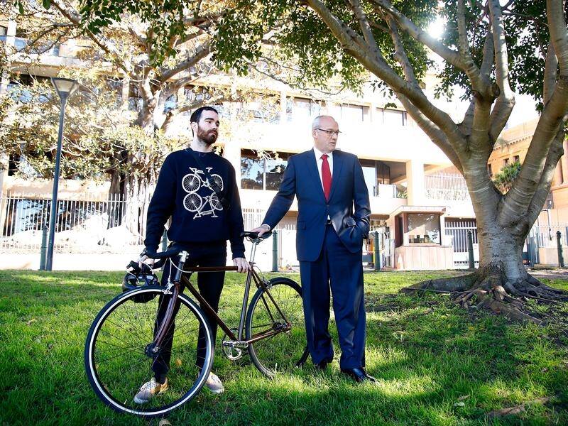 NSW Opposition Leader Luke Foley with food delivery worker Kirby Weller.