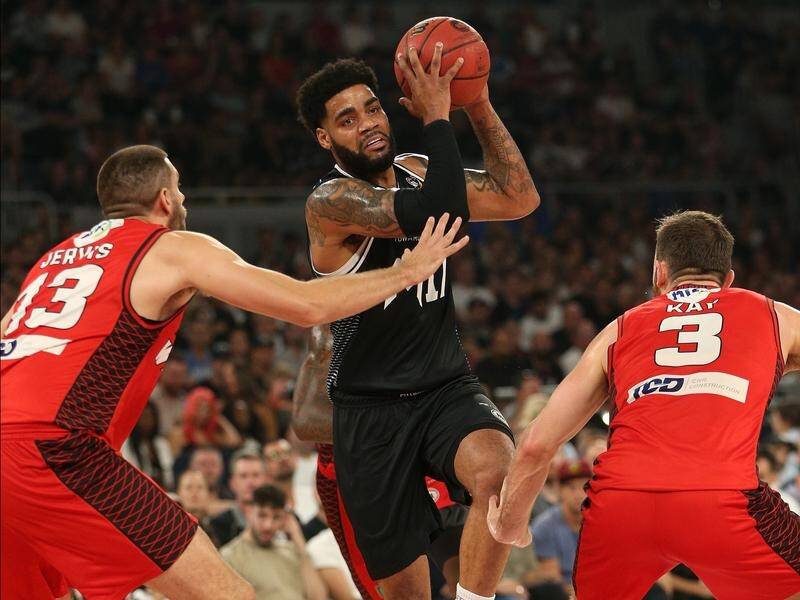 Melbourne's DJ Kennedy (C) had a big night on the boards in Game 2 of the NBL grand final series.