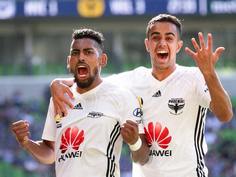 Roy Krishna (L) has scored twice in Wellington's 3-3 A-League draw with Melbourne Victory.