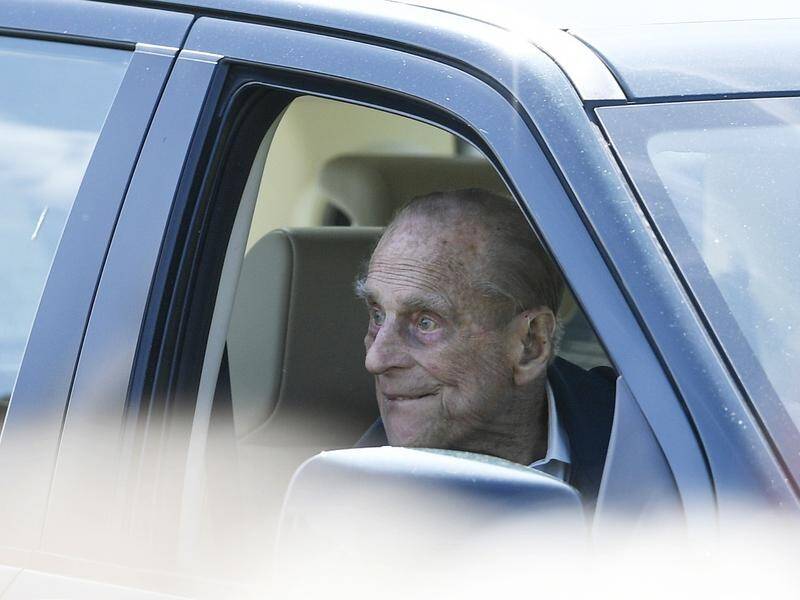 A woman involved in Prince Philip's car crash wants him charged if he is found to be responsible.