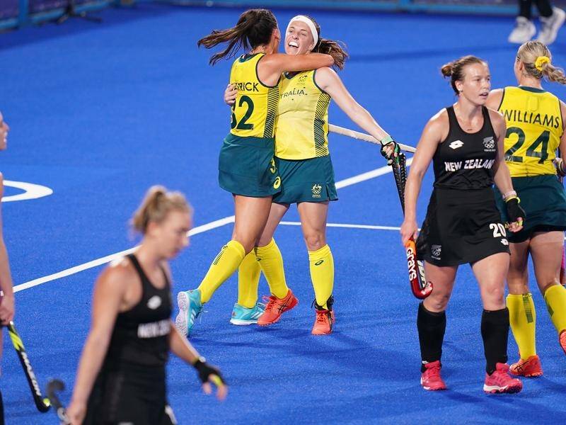 Australia's Hockeyroos celebrate Emily Chalker's winning goal against New Zealand.