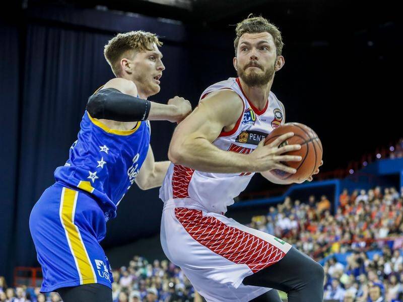 Angus Brandt (left) is leaving NBL champions Perth to ideally continue his career in Europe.