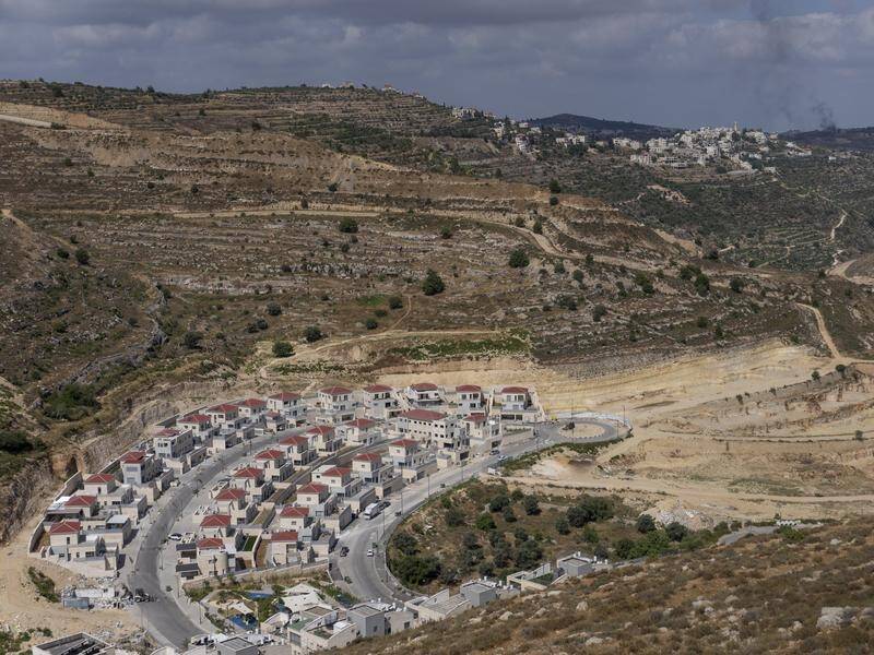 Israel has tabled plans to approve thousands of building permits in the occupied West Bank. (AP PHOTO)