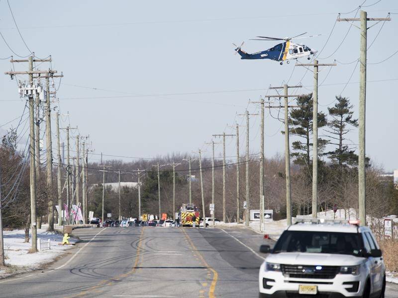 The area around the UPS facility was in lockdown before New Jersey police shot the gunman.