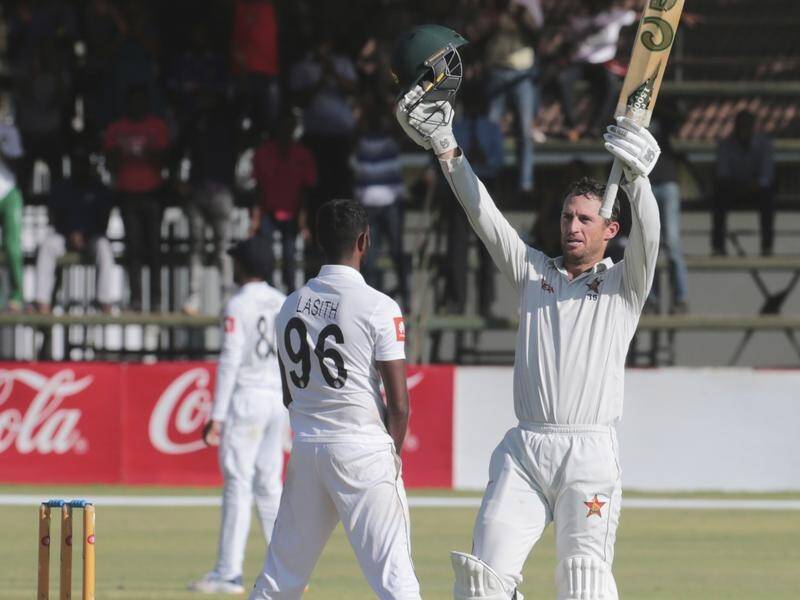 Zimbabwe's Sean Williams celebrates his century against Sri Lanka at Harare Sports Club.