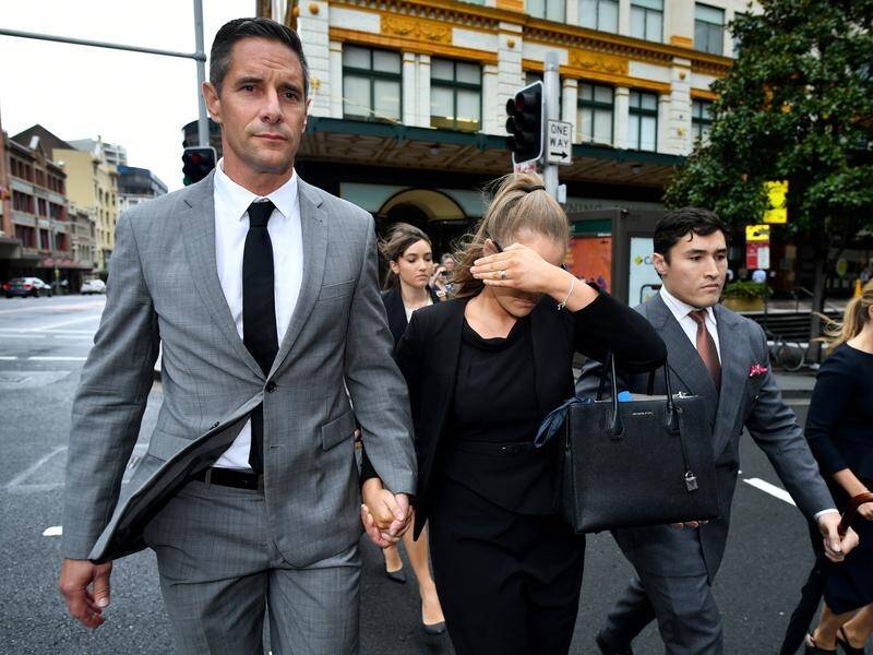 Sarah Jane Chisholm Rogers sports a gold ring as she leaves court with partner Roman Quaedvlieg.