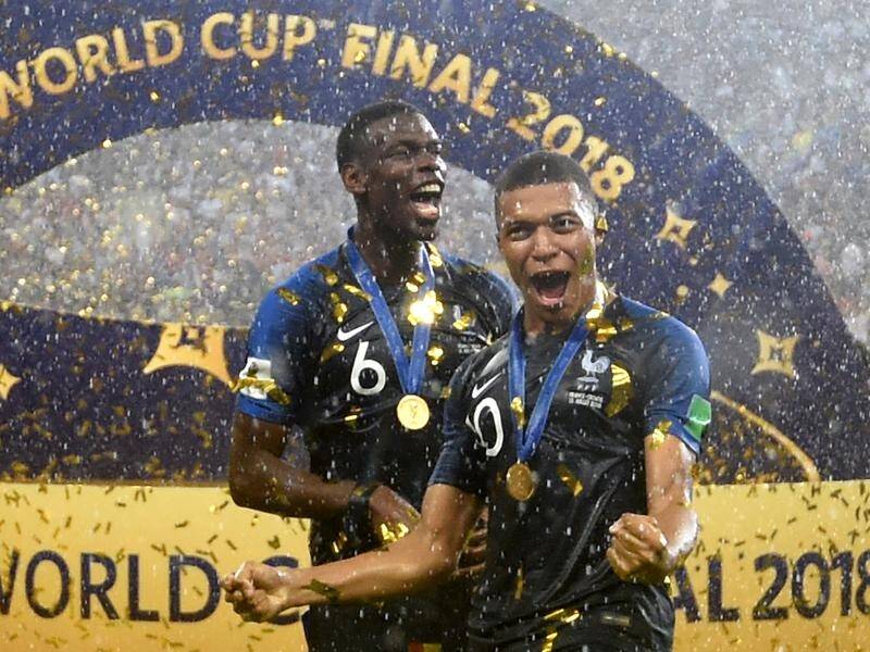 France's Kylian Mbappe (R) has become the youngest player since Pele to score in a World Cup final.