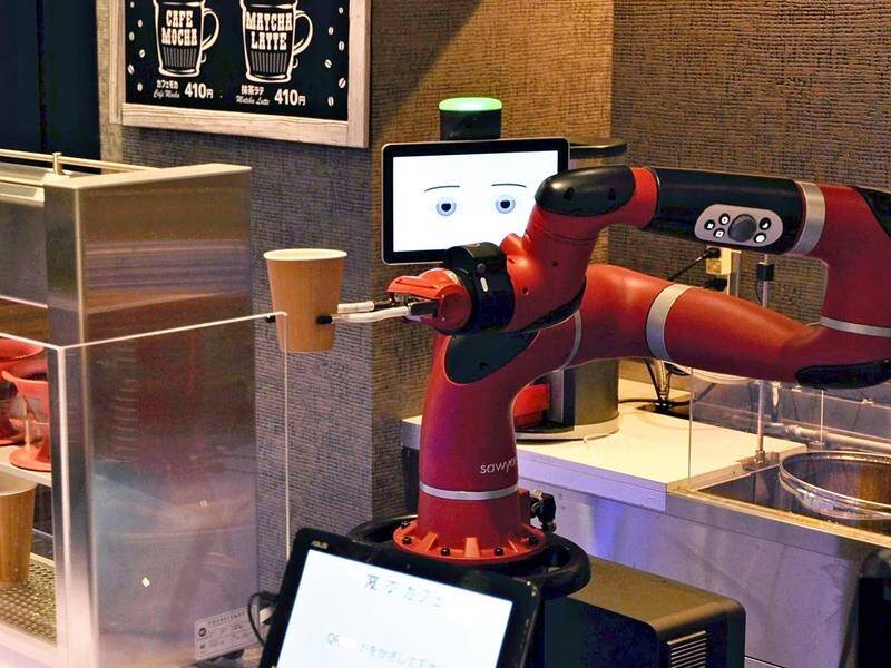Sawyer the robot barista makes the coffee at a cafe in downtown Tokyo.
