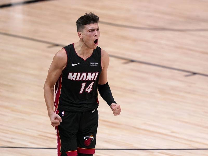 Rookie Tyler Herro joined exalted company as the Miami Heat beat the Boston Celtics in the NBA.