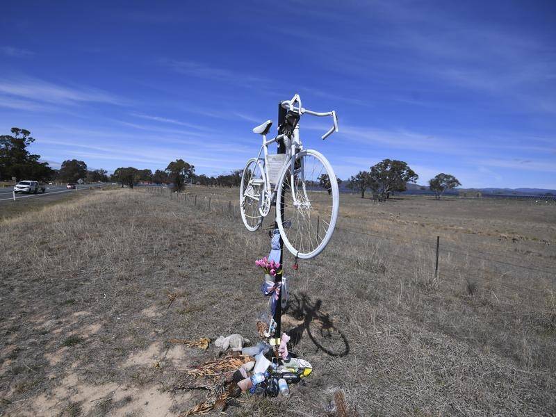 Two drivers almost hit ultra-endurance cyclist Mike Hall before a car fatally hit him near Canberra.