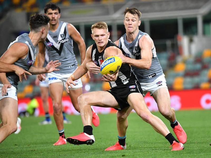 Adam Treloar looks set to depart from the Magpies despite having five years left on his contract.