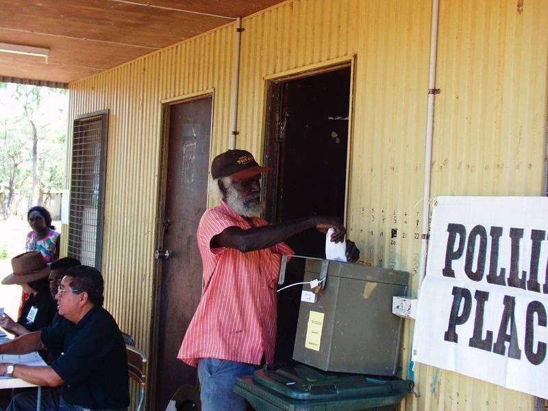 A federal parliamentary inquiry has heard evidence of bullying and harassment of Indigenous voters.