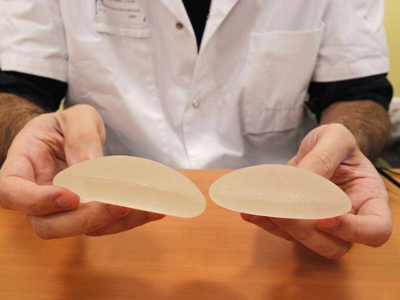 The TGA is recommending action on some breast implants associated with a form of cancer.