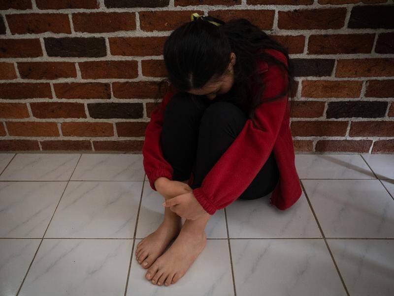 The school attendance of two young children plummeted when they were taken into state care in NSW. (Lukas Coch/AAP PHOTOS)