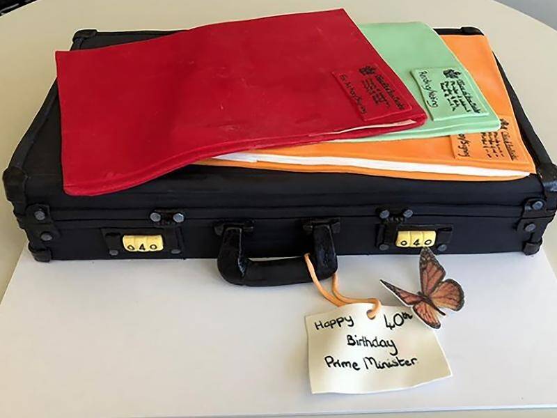 A briefcase cake has helped New Zealand Prime Minister Jacinda Ardern celebrate her 40th birthday.