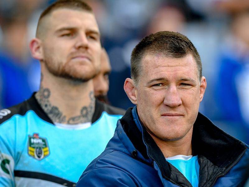 Cronulla star Paul Gallen (C) says NRL teammate Josh Dugan (L) is stressed and has a lot going on.
