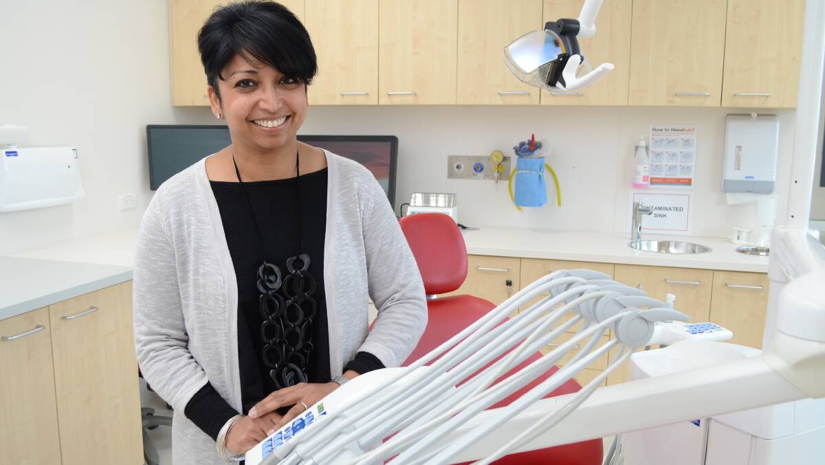ALL SMILES: Dr Sabrina Manickam is hoping to increase accessibility and education of oral health issues in her new role as president of the NSW Australian Dental Association. Photo: JUDE KEOGH 0929dentist1
