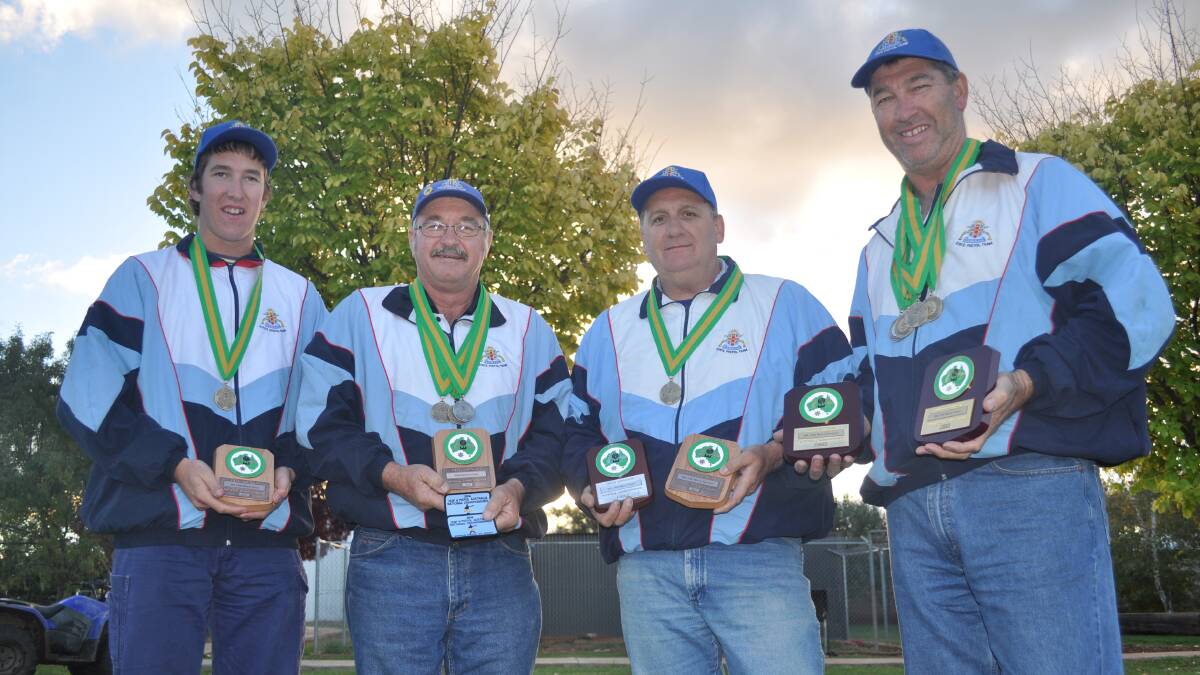 ON TARGET: Peter Brus (left), Max Wicks, Dave Oates and Dean Brus show off their medals after returning from ISSF/PA National Championships.
Photo: Nick McGrath  0430nmshoot2