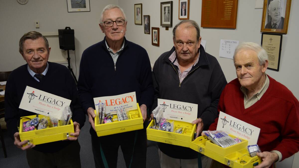 WALKING THE STREETS: Orange Legacy president Bob Garvin with Legatees James Linton Ned Tidswell and Rob Blake show off the boxes they will carry around Orange to sell merchandise from for Legacy Week. Photo: ALEXANDRA KING		                0827aklegacy