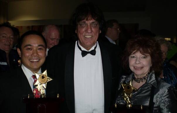 TOO YOUNG: Peter Young met Jon English in 2009 at the Canberra Area Theatre awards with Janice Harris.
