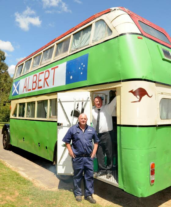HISTORY ON WHEELS: John and Wayne Swadling say Albert the bus has seen many things on its trans-continental adventures. Photo: STEVE GOSCH 		             0202sgalbert2
