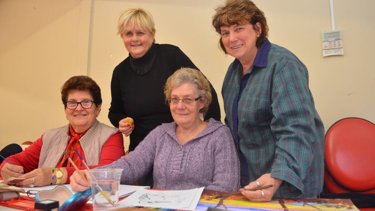 NAME NEEDED: Orange Senior Citizens and Pensioners Centre art class co-ordinators Jan Savage and Wanda Driscoll (back) with students Antonia Covelli and Linda Larsen. Photo: DANIELLE CETINSKI 0617dcpensioners1