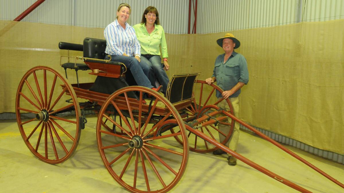 Mandy Emms, Jayne West, Chris Solomon in an Abbot's buggy that will be on display at the Australian National Field Days. Photo: JUDE KEOGH 1020fielddays3
