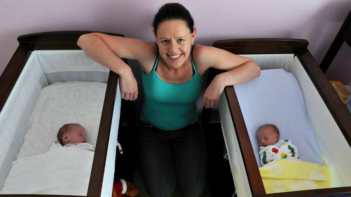 TWICE THE FUN: Rohanne Tiefel with her twins Dominic and Lucas who were born at Orange Health Service last month. Photo: STEVE GOSCH 0107sgtwins
