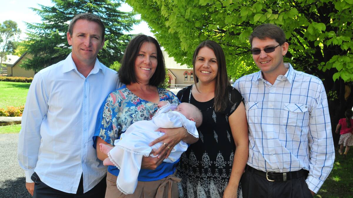HINTON: Godparents Daryl and Kelly Frost, Max Hinton, Tim and Alison Emerton. Photo: JUDE KEOGH