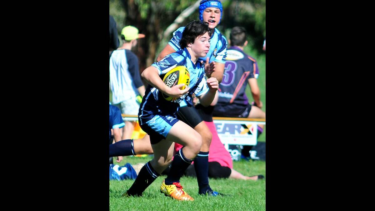 RUGBY LEAGUE: Bloomfield's Luke Rothnie hits the ball up againsy Bathurst St Pats in the under 15s. Photo: STEVE GOSCH