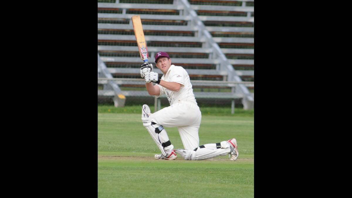 CRICKET: Cavaliers' Brad Wright hits out against CYMS in their ODCA first grade game on Saturday. Photo: STEVE GOSCH