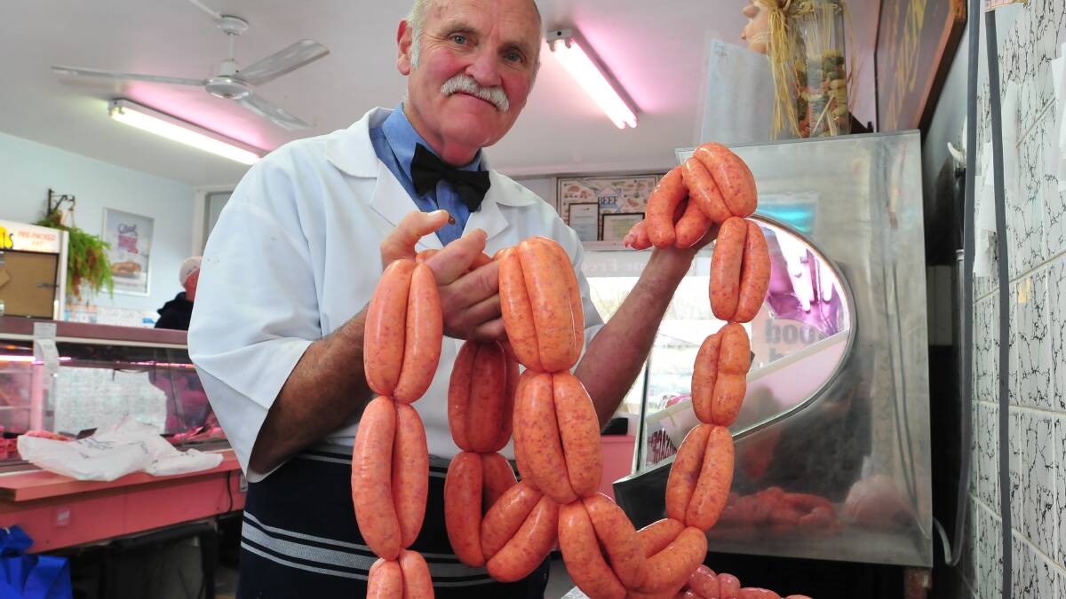 HANGING UP HIS SAUSAGES: After 45 years as a butcher Darryl Nunn has sold his business and is retiring. Photo: JUDE KEOGH0710
