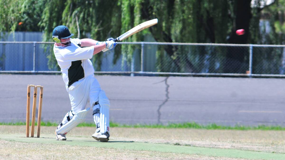 CRICKET: Orange CYMS' Aaron Kilkeary dispatches one to the boundary in his side's ODCA centenary cup game against Orange City at Moulder Park on Saturday. Photo: JUDE KEOGH