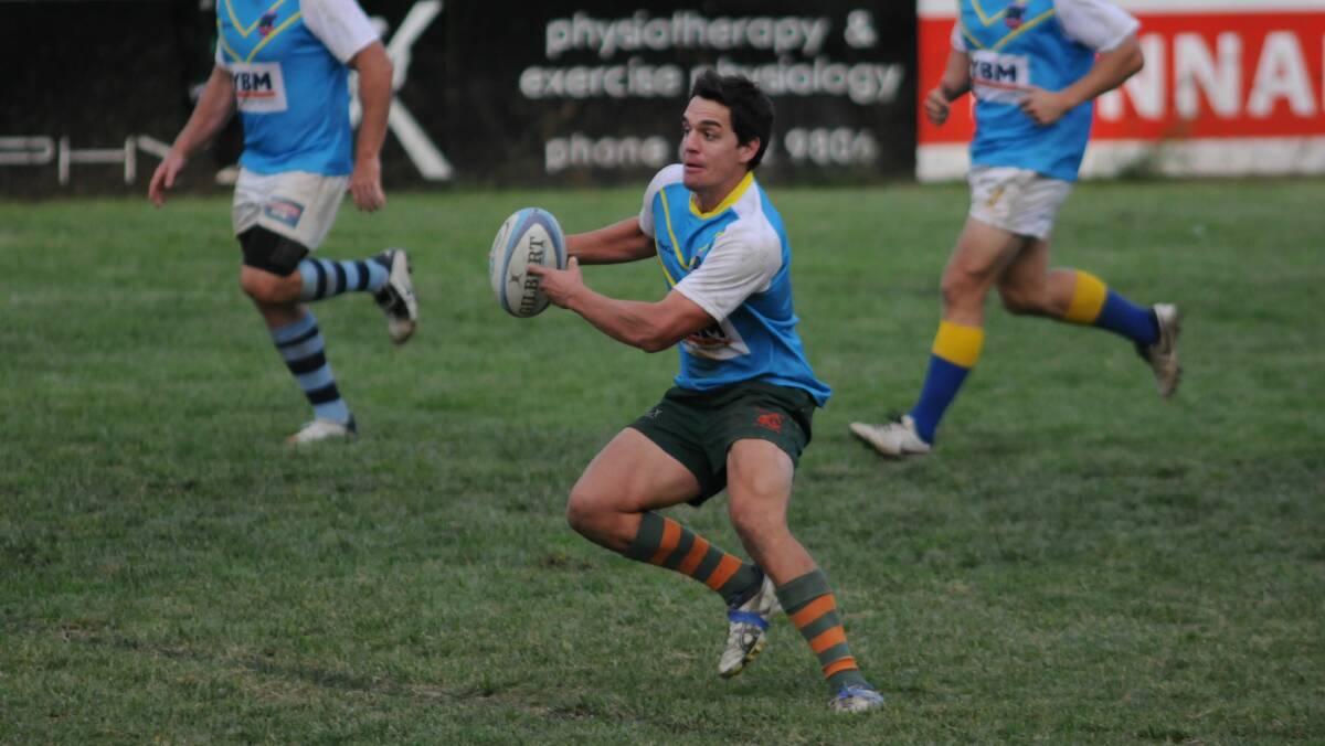 RUGBY UNION: Sam Powell runs the ball during the weekend's Orange City Invitational 10s tournament. Photo: STEVE GOSCH