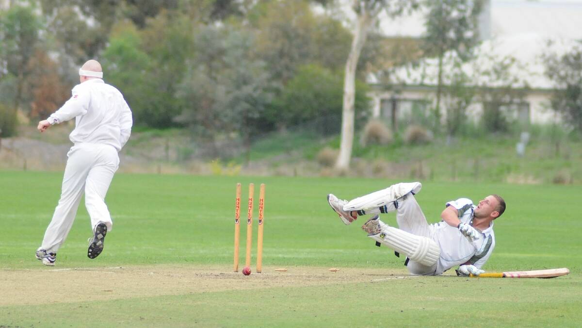 CRICKET: Scott Hanrahan is out after being stumped off the bowling of Charlie Cooper in Saturday's ODCA lower grade action. Photo: STEVE GOSCH