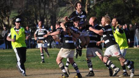 GRAND FINAL SHOWDOWN: The Molong players celebrate their amazing win. Photos: NICK MCGRATH and DAVE NEIL