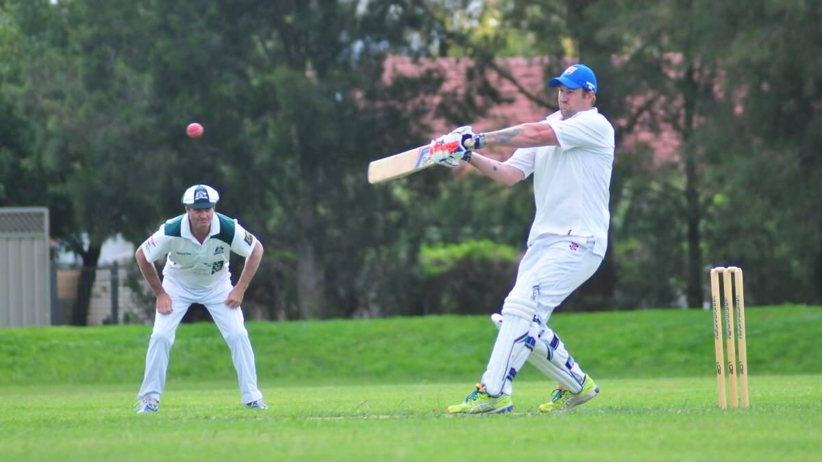 SECOND GRADE: Wanderers' Scott Kennedy hits out against Orange City at Max Stewart on Saturday. Photo: JUDE KEOGH