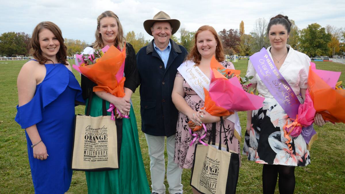 ALL SMILES: Dr Harry Cooper (centre) with showgirl steward Amy Carr (left), entrants Tessa Barrett, Heather Lean and Showgirl 2017 Tess Crossley. Photo: DECLAN RURENGA