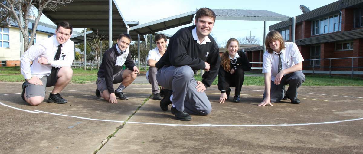 HONOUR: Students Adam Mitchell, Lane Smith, Marcello Carvalho, Mackenzie Saddler (project designer), Hannah Boardman and Jack Robbie where the tribute will be built. Photo: THE IRRIGATOR