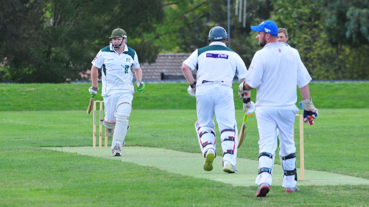 SECOND GRADE: Orange City's Andrew McIntyre completes a run against Wanderers at Max Stewart. Photo: JUDE KEOGH