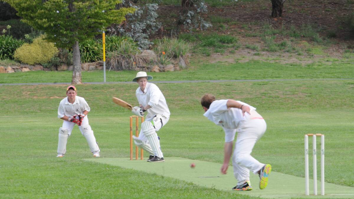 CRICKET: Sam Sutton prepares to lay a short one from Will Currall. Photo: LUKE SCHUYLER