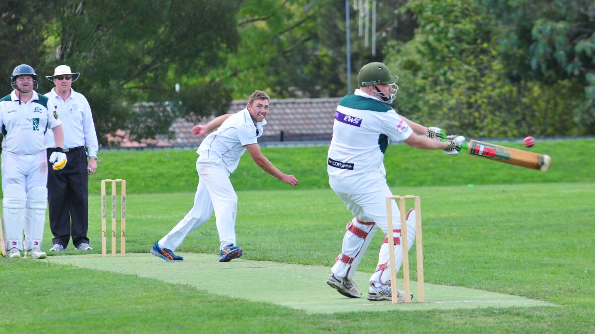SECOND GRADE: Wanderers' Nick Sharp bowls to Orange City's Andrew McIntyre in the second grade decider at Max Stewart. Photo: JUDE KEOGH