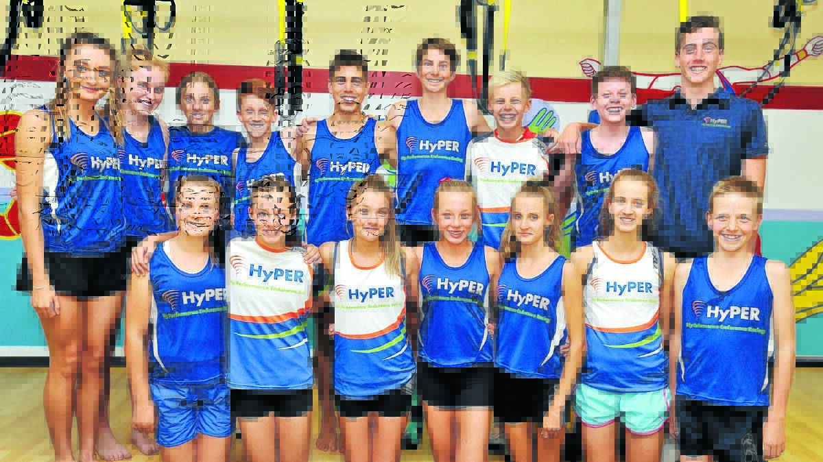 NATIONAL HOPES: (back, from left) Lauren Kerwick, Brittany Wills, Charlotte Simmons, Luc Nelson, Ethan Buesnel, Jack Bilton, Rory Thornhill, Ben Broadley, Harry Bryant, (front) Abby Dean, Bonnie Keegan, Annie Goodlock, Xanthe Keegan, Jessie Dean, Kelsey Gray and Tom Tudor are just some of the HyPER group heading to the state titles on Wednesday.
 Photo: JUDE KEOGH  0229triathletes