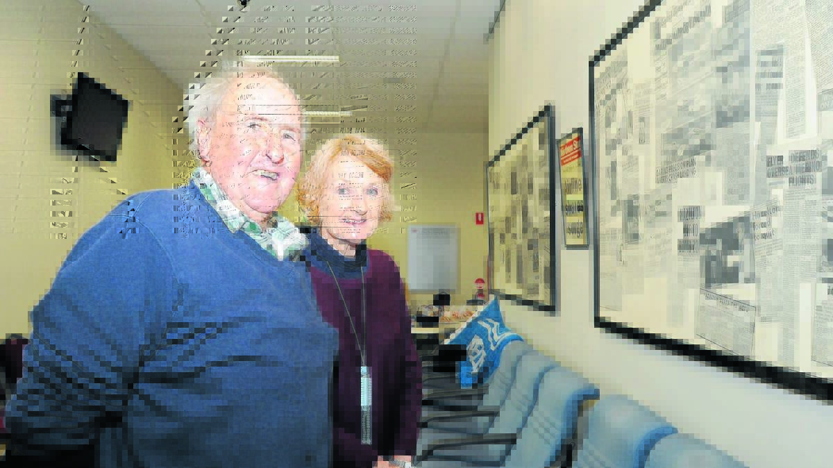 Dick and Bronwen Myers read up on Orange's aviation history. Photo: STEVE GOSCH                                                                                                                                                                                              0604sgaero5