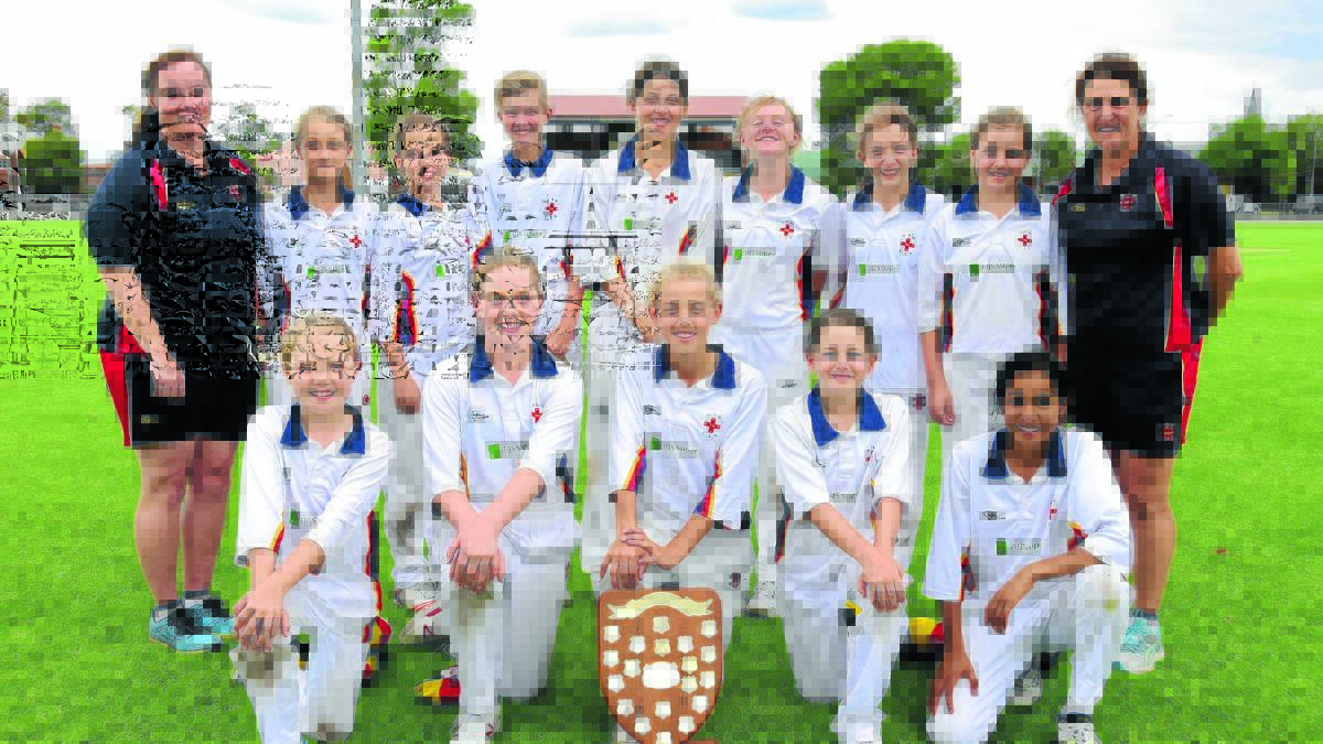 UNDISPUTED CHAMPIONS: Phoebe Litchfield (centre, with trophy) and her CIS teammates claimed the NSWPSSA Girls' Cricket Championship, before she was named captain of the state side. Photo: BELINDA SOOLE