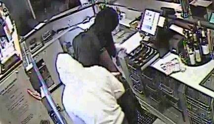 JAILED FOR ROBBERY: CCTV footage of Adrian Bunn and Joshua Cooper robbing the Wentworth Golf Club in April 2013. Photo: SUPPLIED