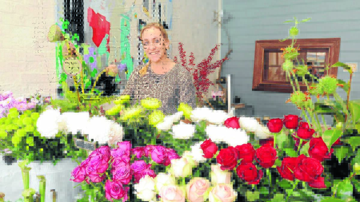 BUDDING BUSINESS: Libby Spencer says she offers arrangements with a twist.
Photo: JUDE KEOGH 0507botanica